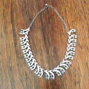 Silvertone choker with iridescent crystals